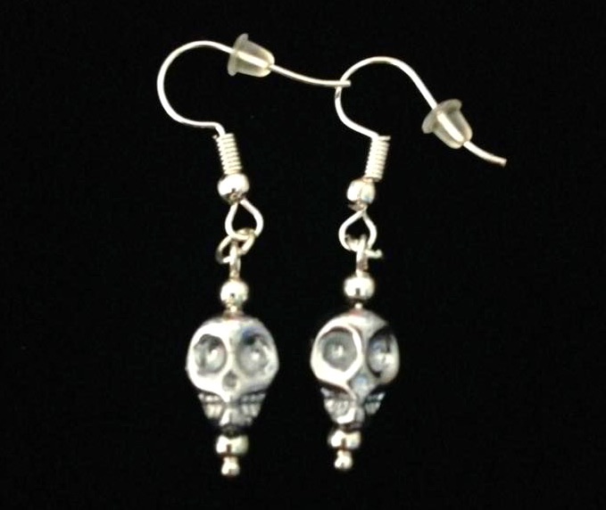 *No.930 Mini Light Green Crystal Skull Earrings