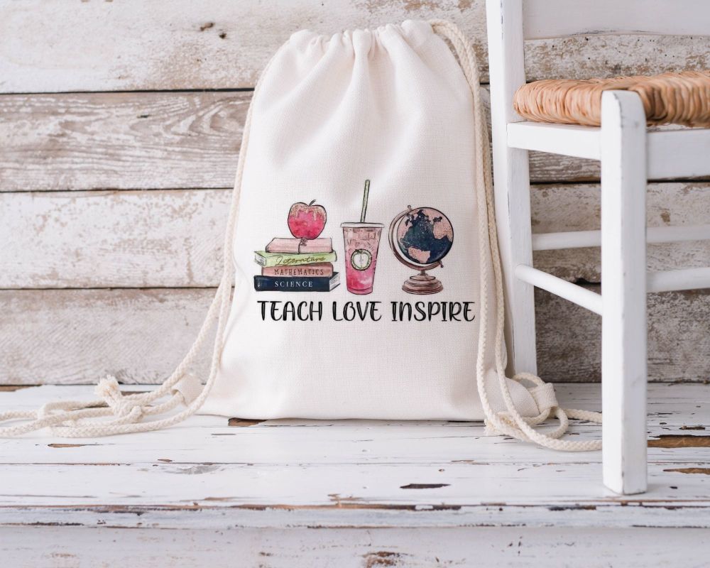 Teach, love, inspire printed drawstring bag
