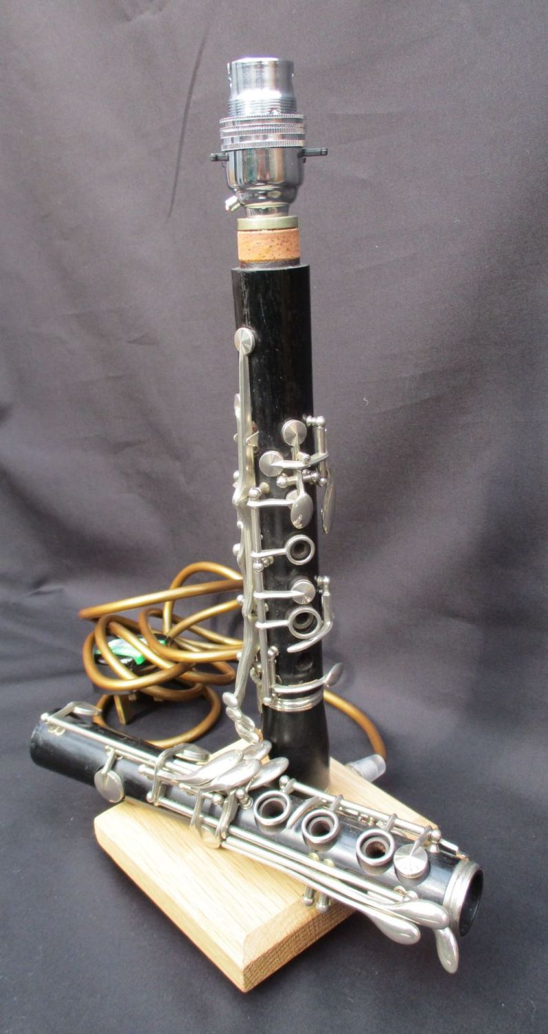 Clarinet in two pieces on waxed oak ~ Instrument Light / Lighting