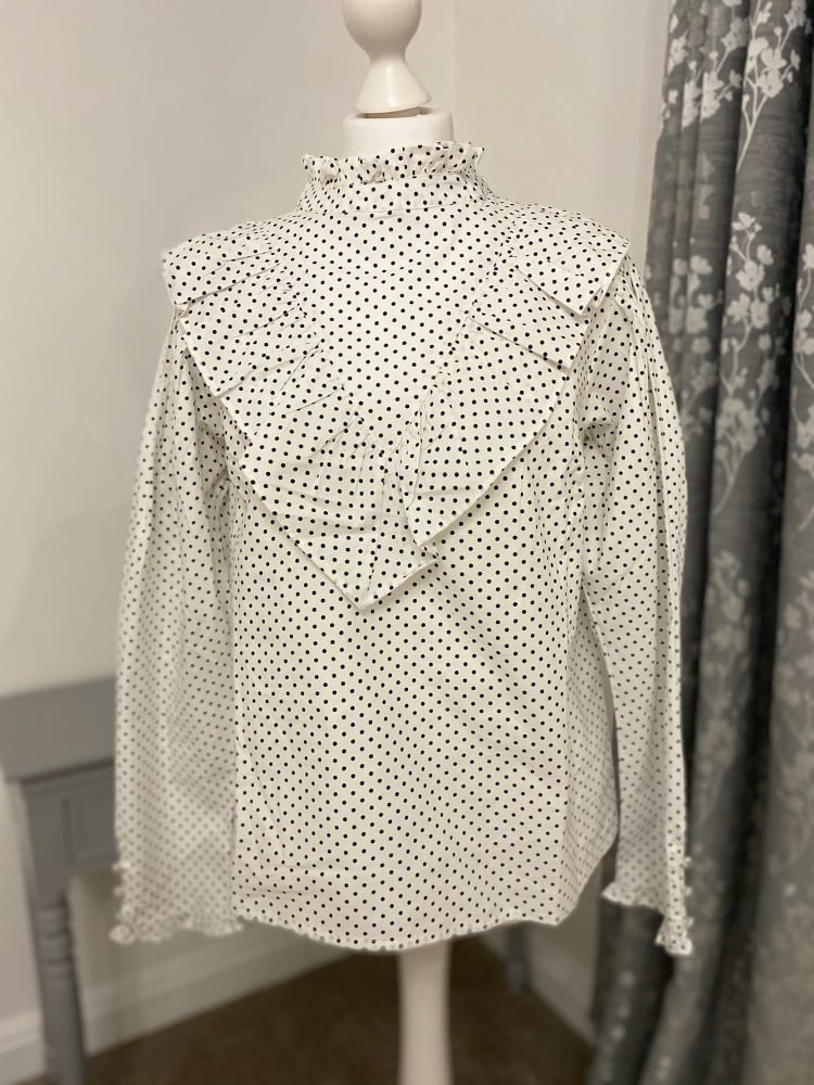 White & black polka dot frill high neck blouse
