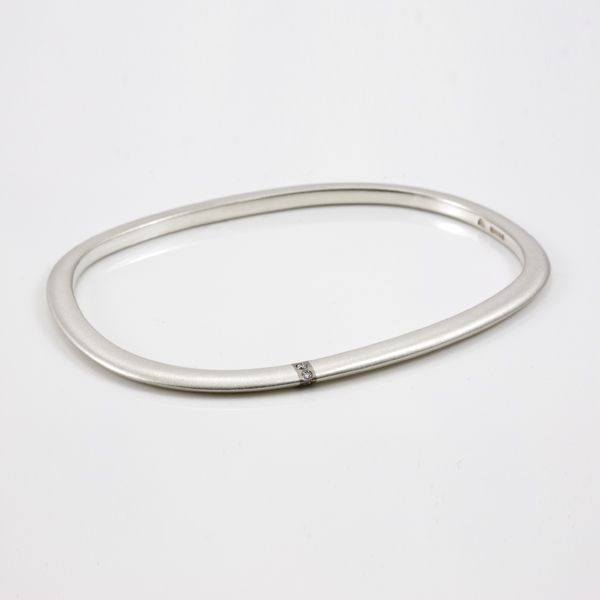 Lode silver bangle with gold inlay and diamonds