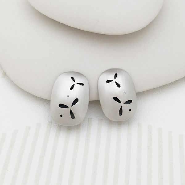 Pierced Silver Clip-on Earrings