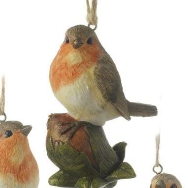 Gorgeous Robin Red Breast Bauble sitting on a Hazlenut