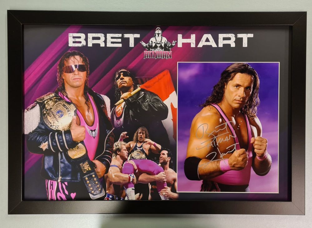 Bret The Hitman Hart Hand Signed And Framed Wrestling Photograph In A Framed Presentation.