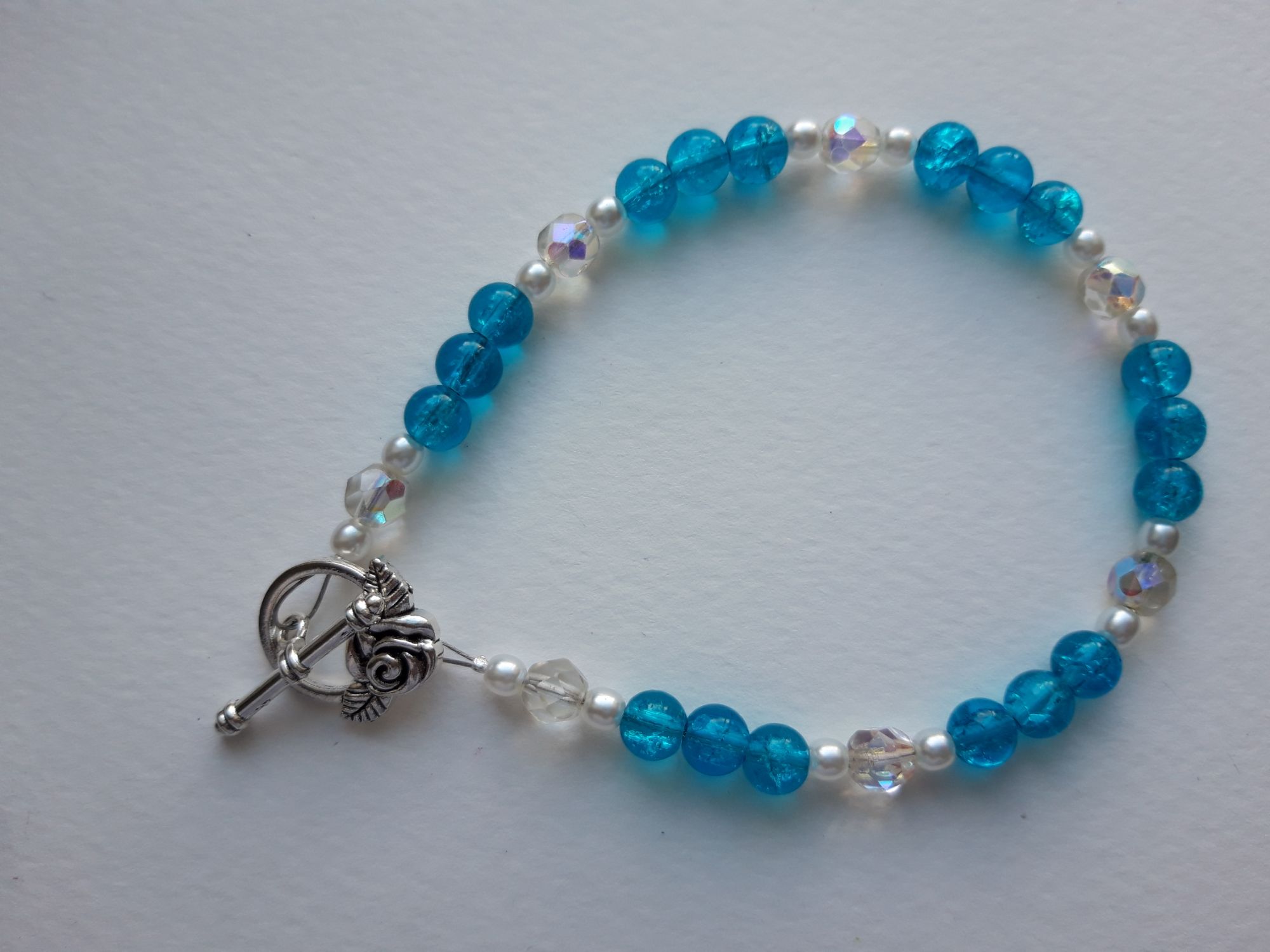 Handmade Bracelet using blue beads and a toggle fasten