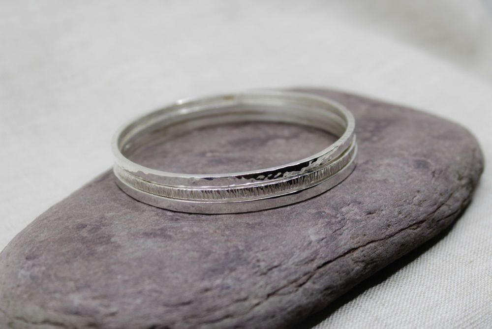 Set of three sterling silver bangles