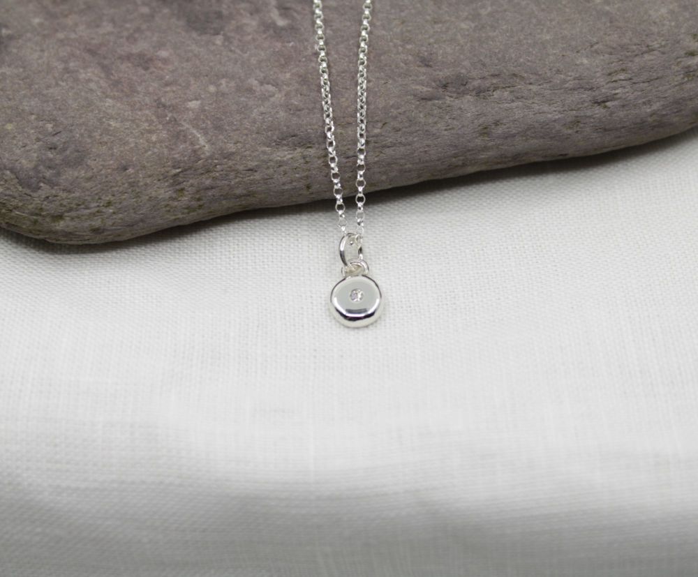 Sterling silver pebble with 2mm Moissanite necklace