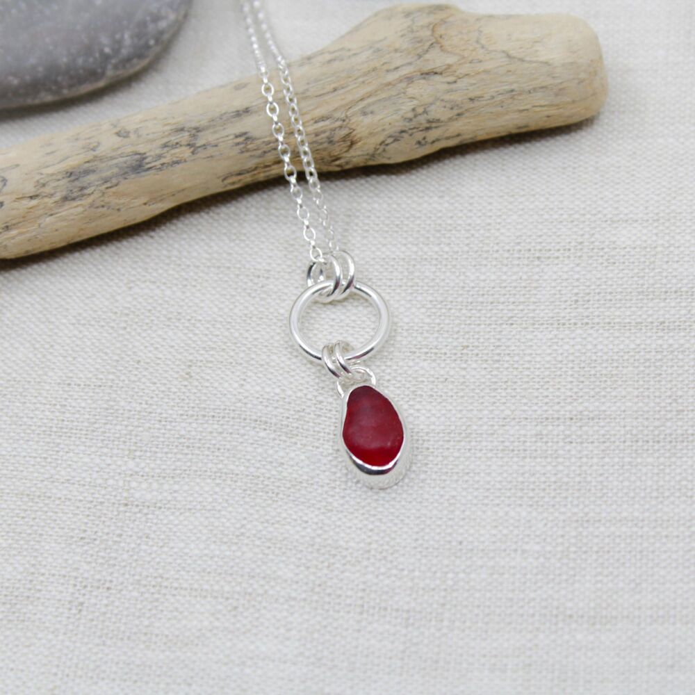 Red sea glass and sterling silver pendant