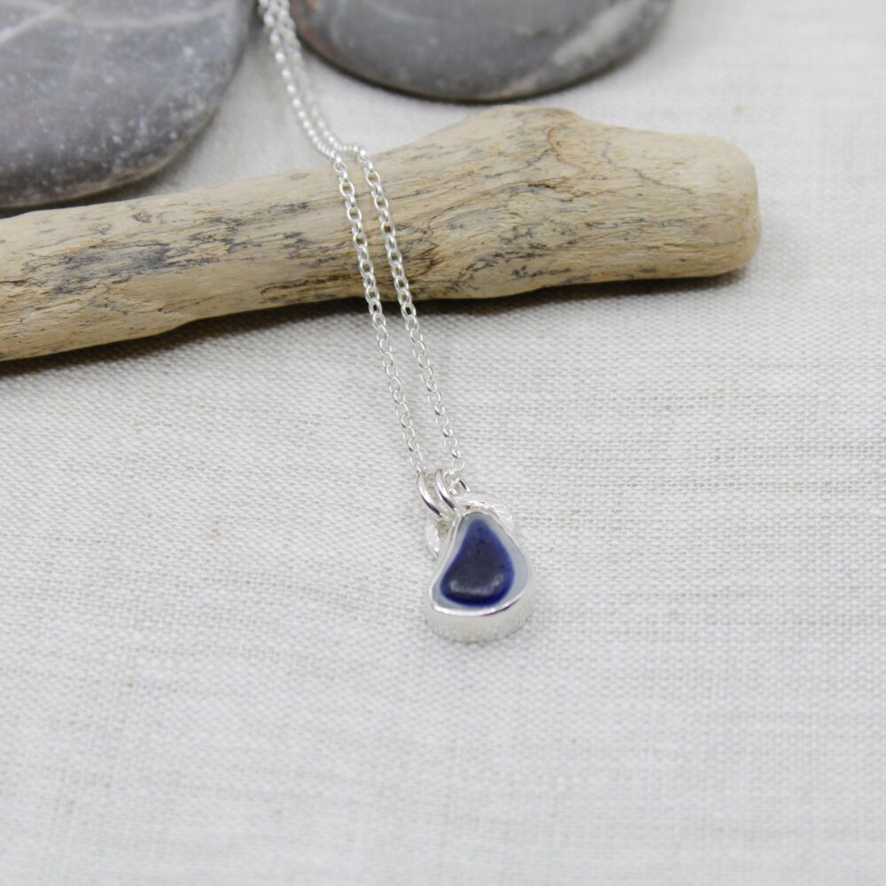 Cobalt blue and white multi coloured sea glass pendant