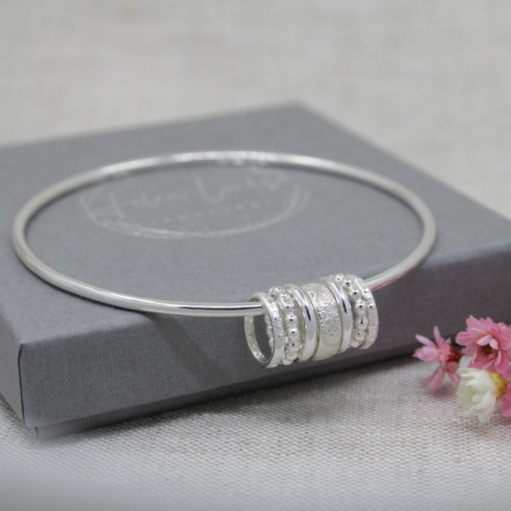 Hallmarked sterling silver charm bangle