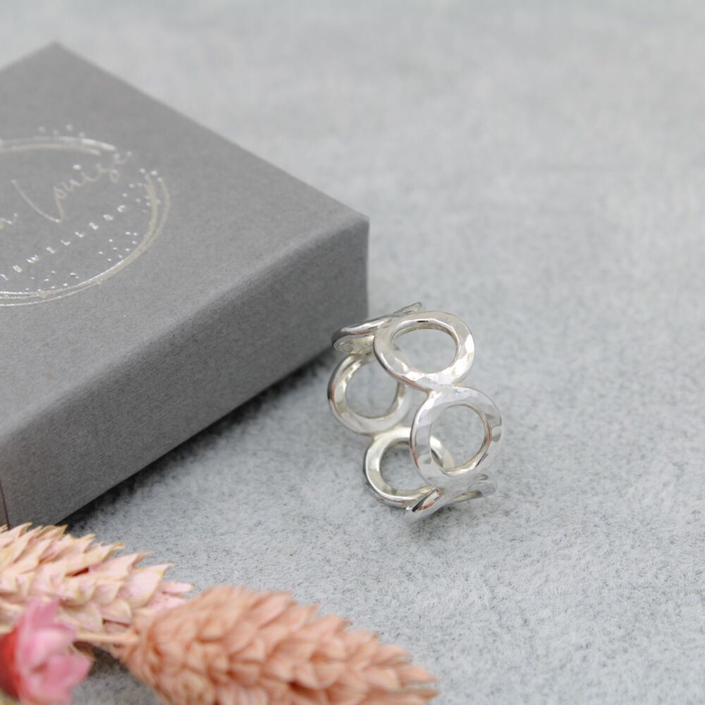 Sterling silver textured circle band ring