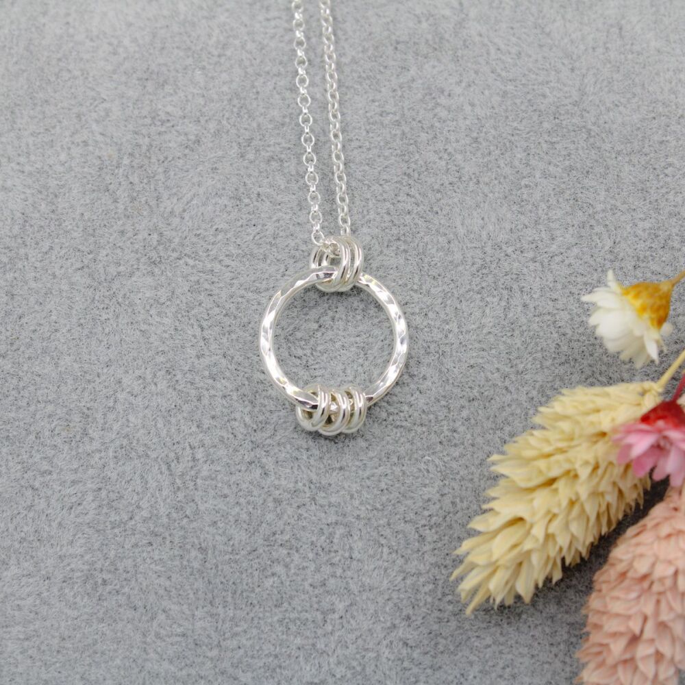 Sterling silver hammered fidget necklace