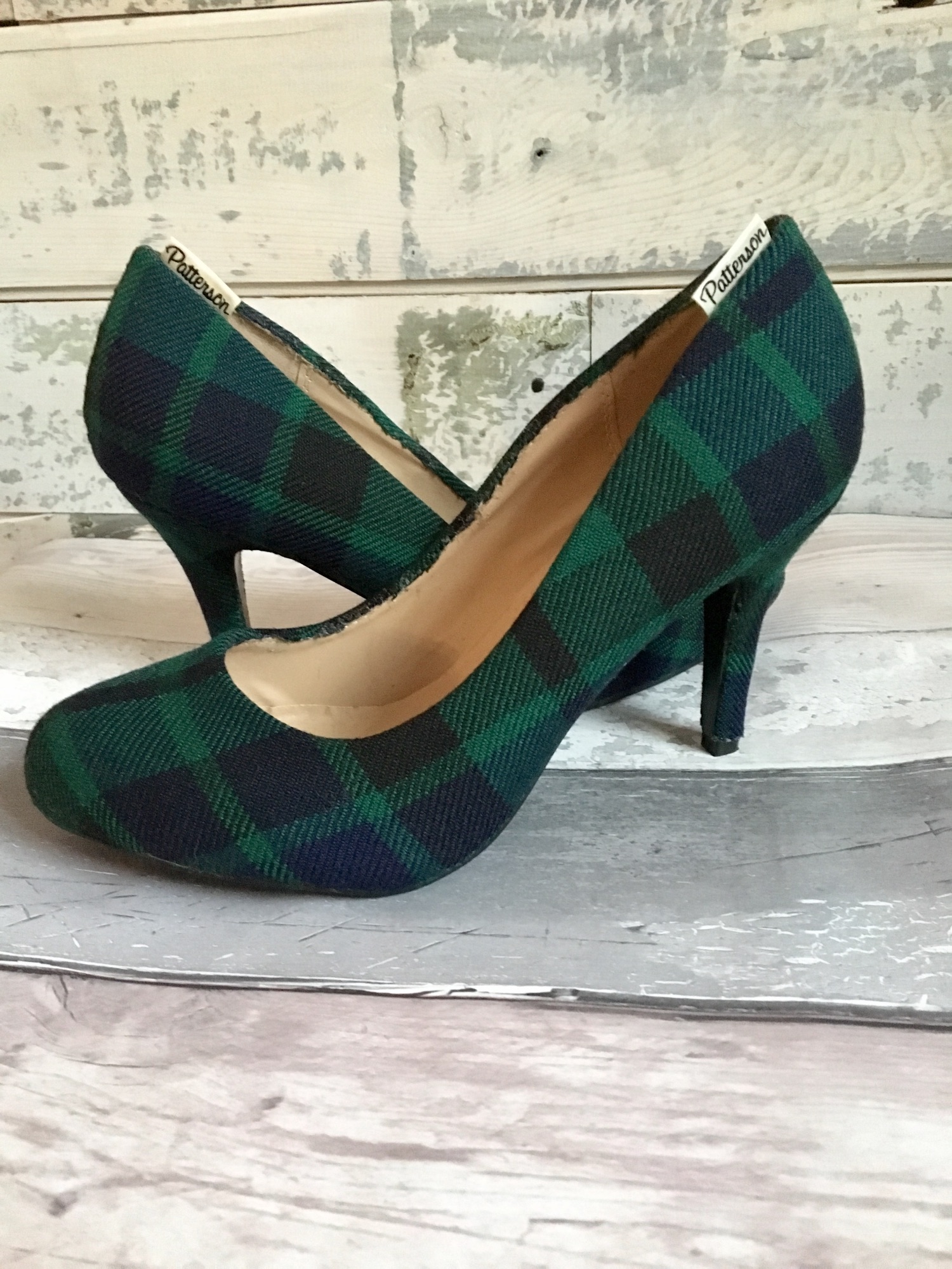 Custom tartan shoes, with personalised tags.