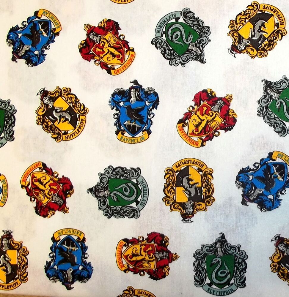 Harry Potter Fabric 135cm (54") wide approx. Sold as FQ, 1/2m or 1m length House Crest Badges