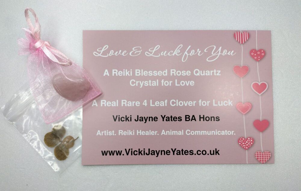 Love and Luck. Reiki Blessed Rose Quartz Crystal and a Rare 4 Leaf Clover.