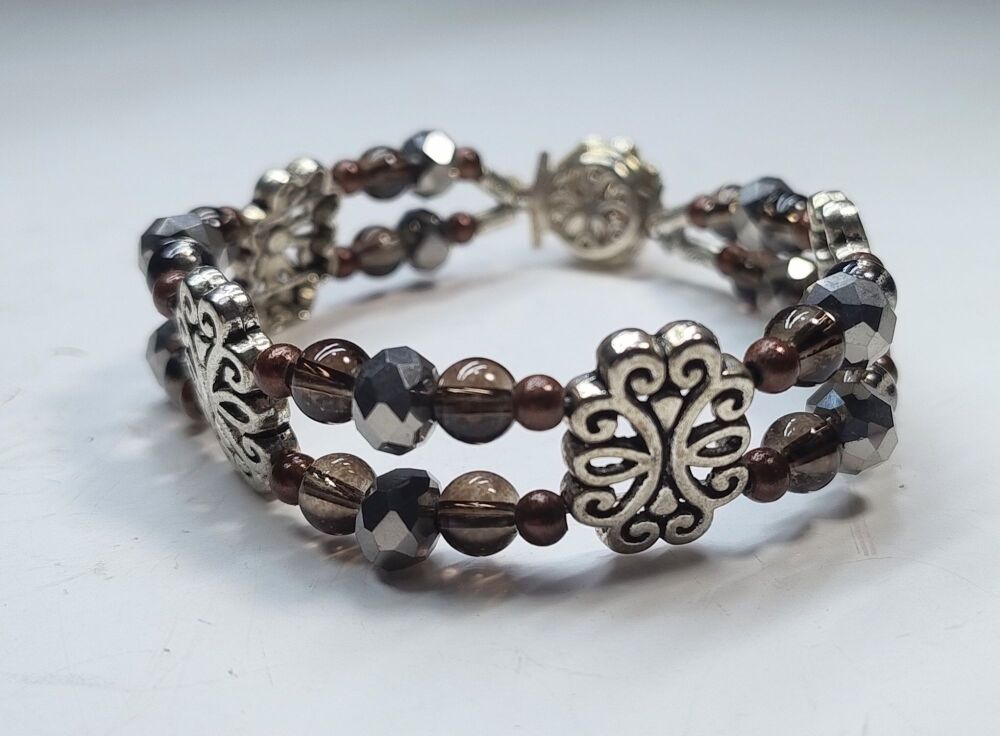 Smokey Quartz Bracelet. Double Strand. Fixed length with decorative clasp.