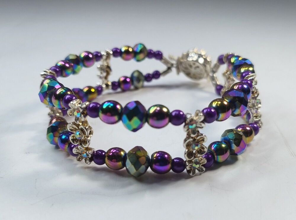 Rainbow Hematite Bracelet. Double Strand. Fixed length with decorative clasp.
