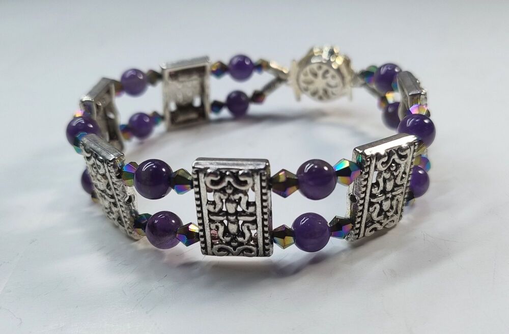 Amethyst Bracelet. Double Strand. Fixed length with decorative clasp.