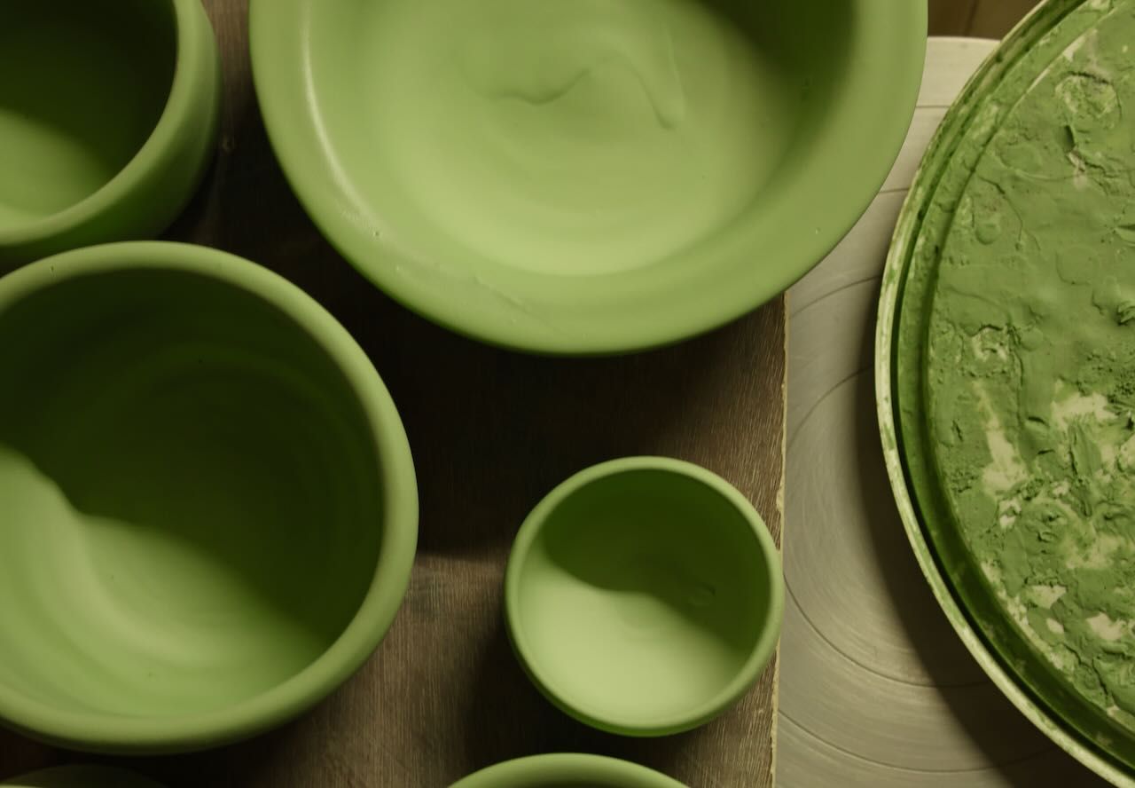 Ceramic forms dipped in green glaze