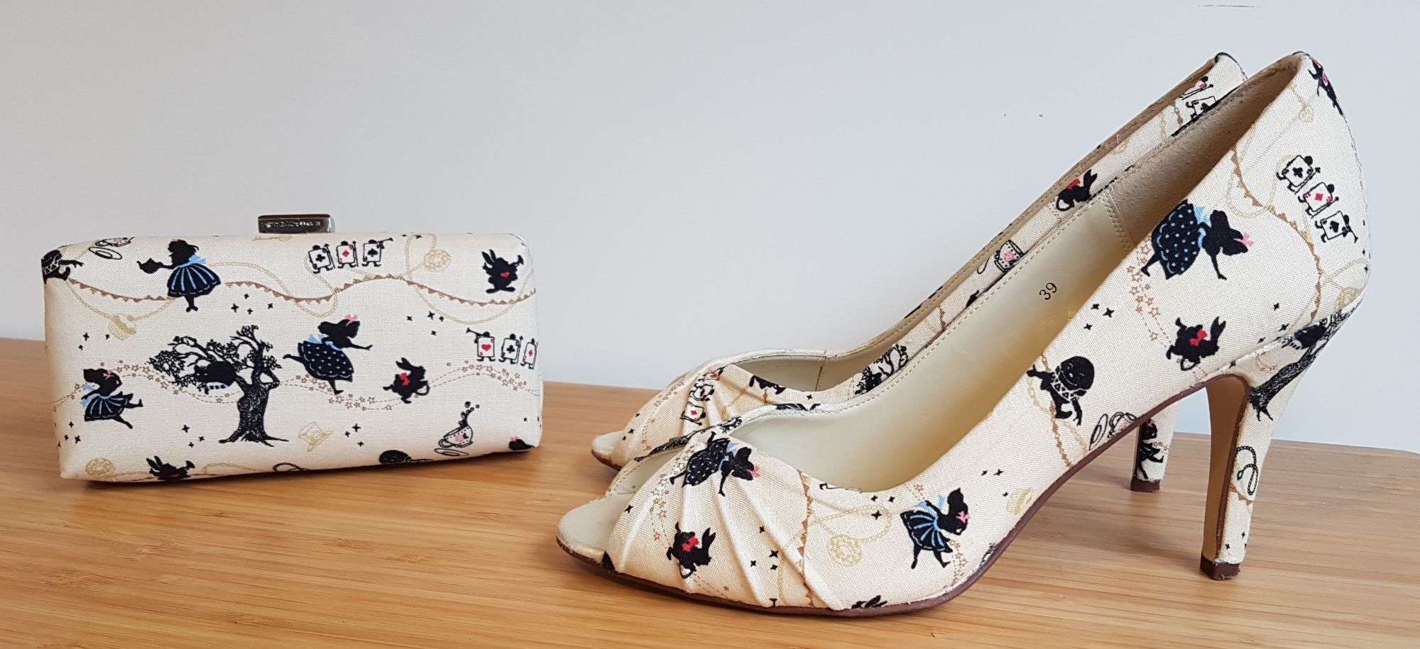 Alice in Wonderland heels and clutch bag