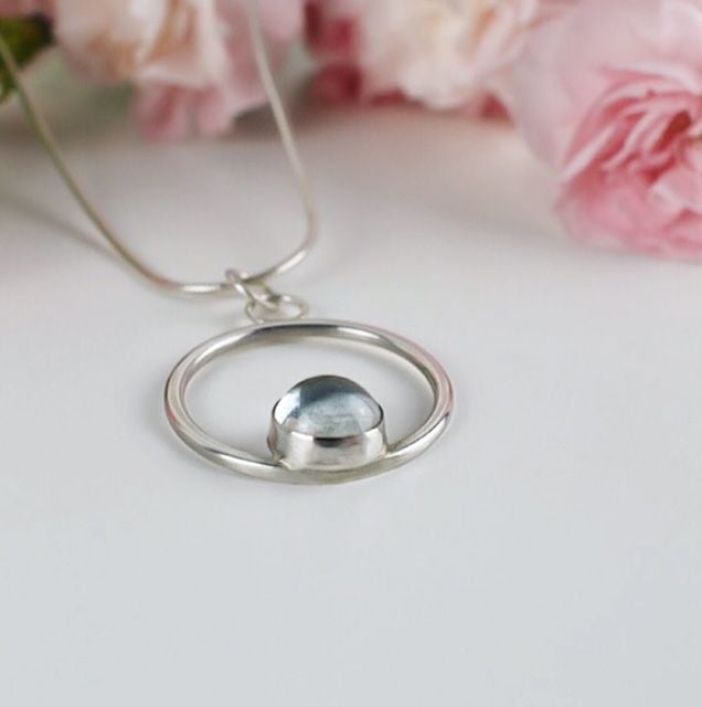 Astrid Pendant Handcrafted out of Ecosilver/ recycled Sterling silver with Aquamarine cabochon. Made by The Sylverling Workshop