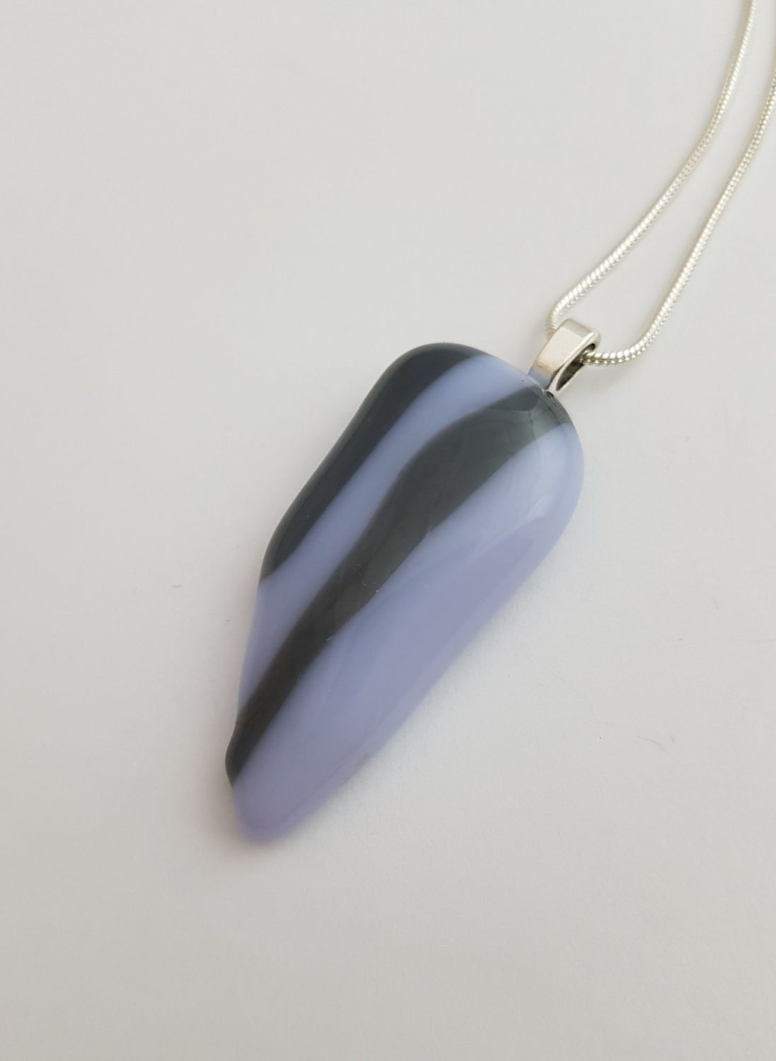 Mauve and dark grey pebble pendant
