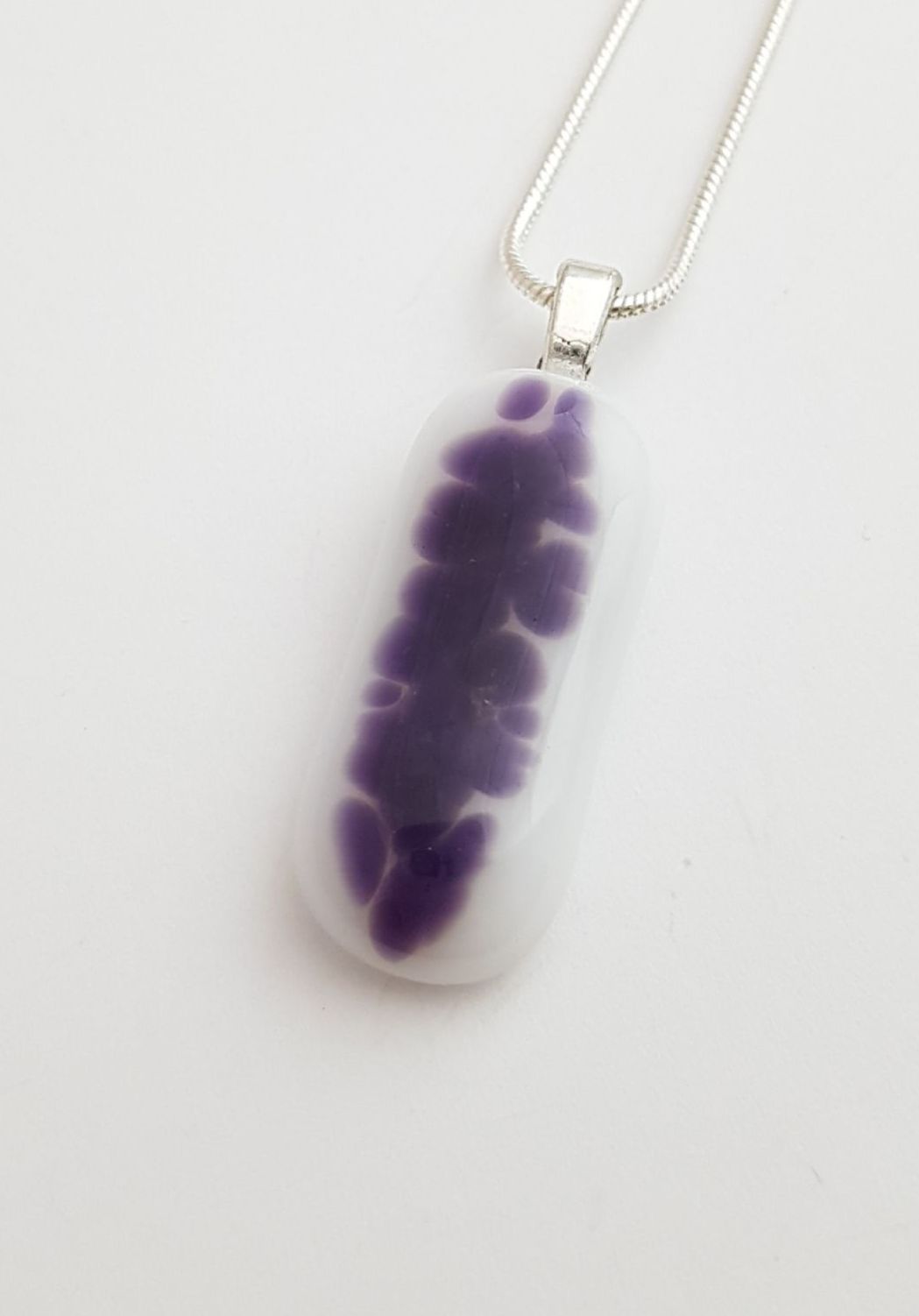 White with dark purple speckles pendant