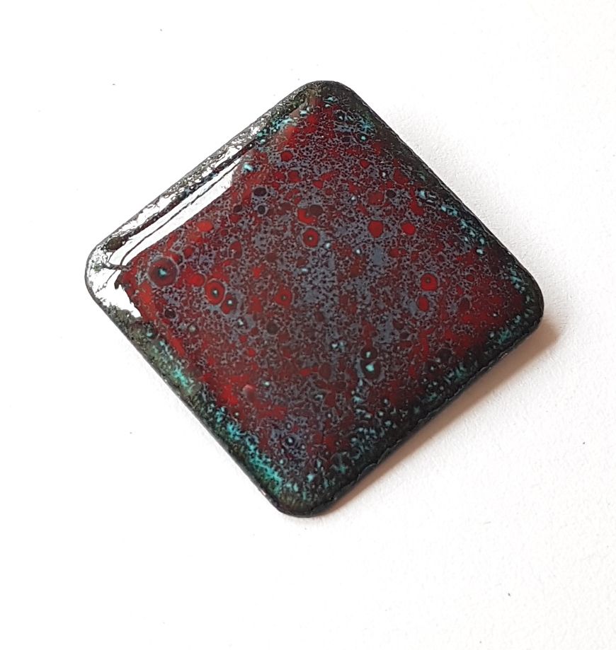 Maroon red with turquoise speckles brooch