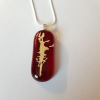 Transparent red with gold mica tendrils