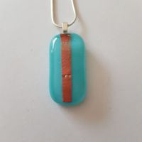 Turquoise blue oblong pendant with plum mica stripe