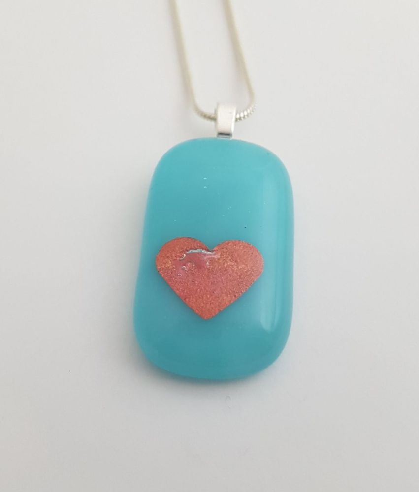 Turquoise pendant with plum mica heart