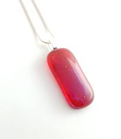 Iridescent red glass pendant with blue shimmer inside