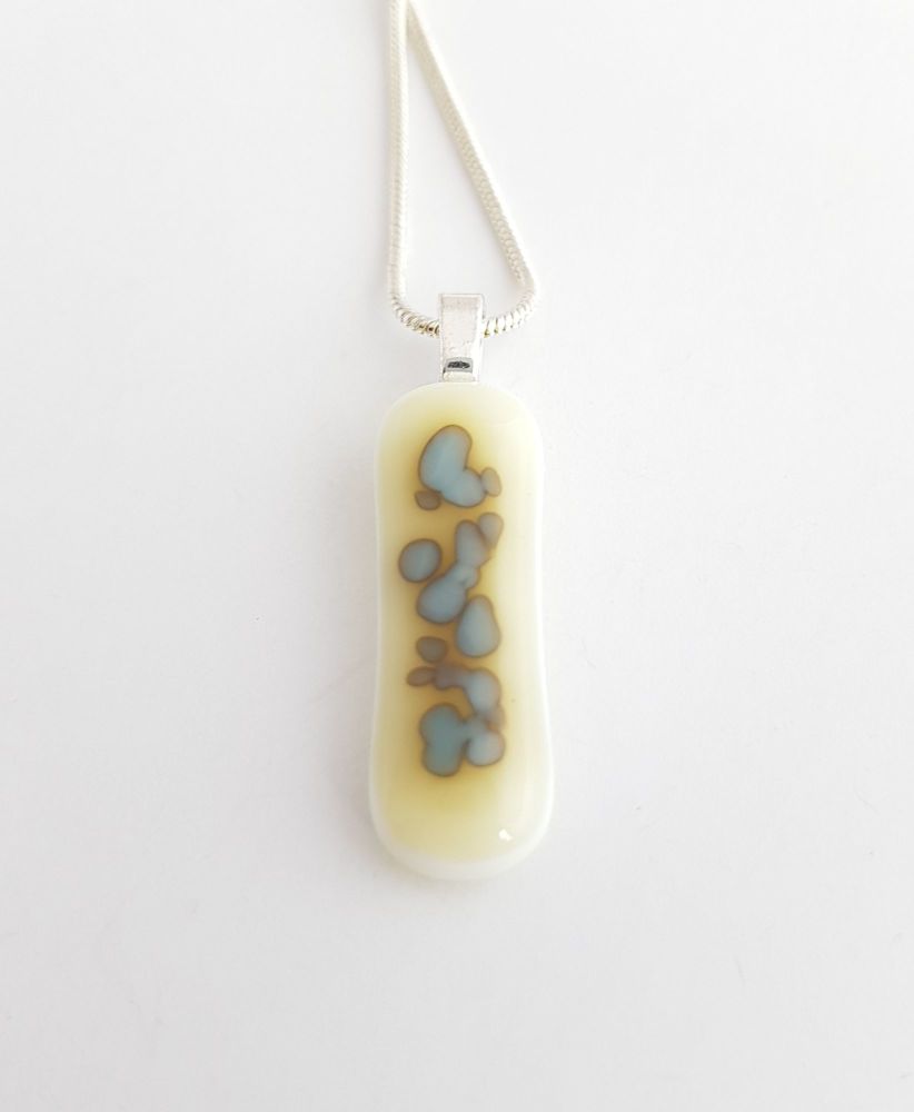 Vanilla glass with turquoise grey speckles pendant