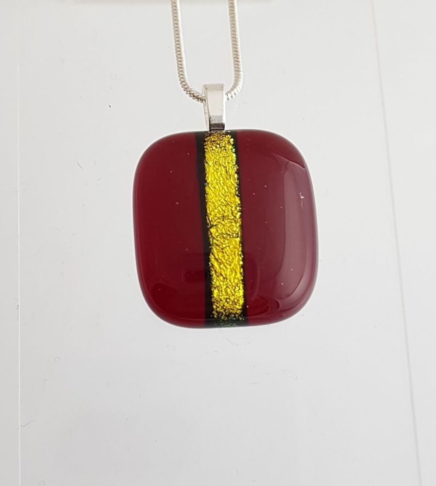 Garnet red with gold dichroic stripe