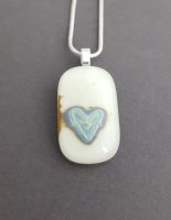 Vanilla oblong pendant with reactive sterling silver heart