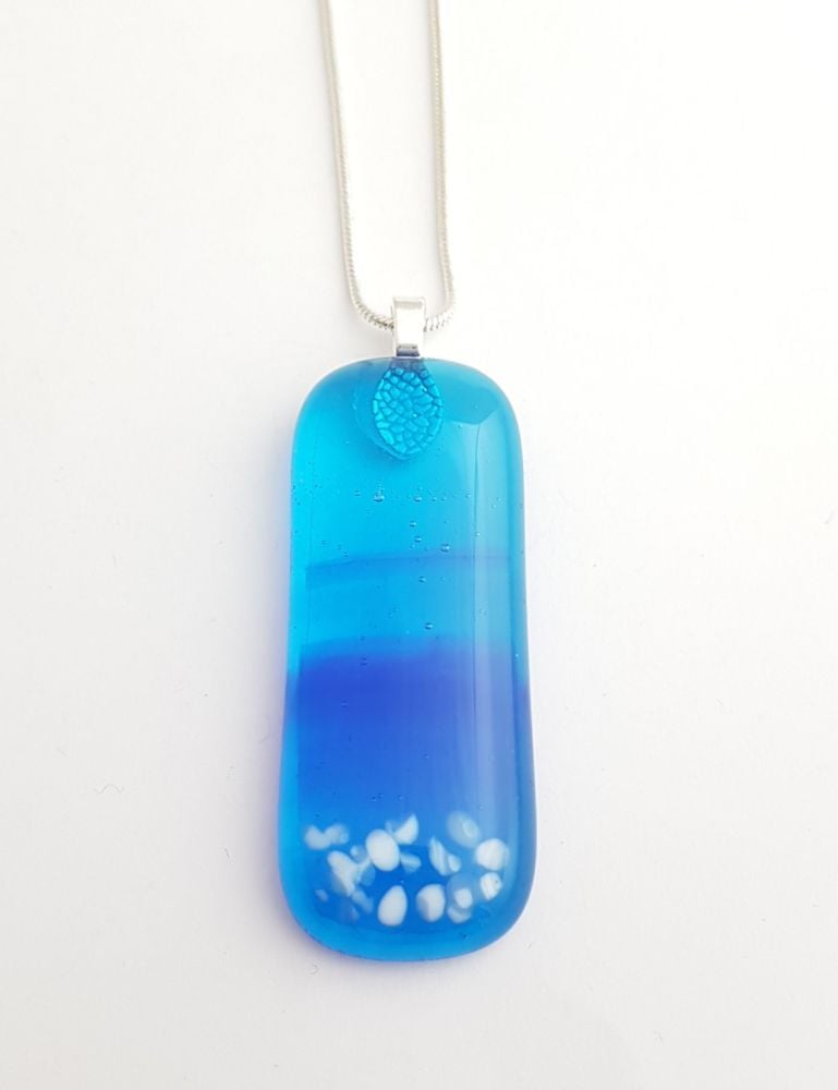 Swirly blues long pendant with pebbles