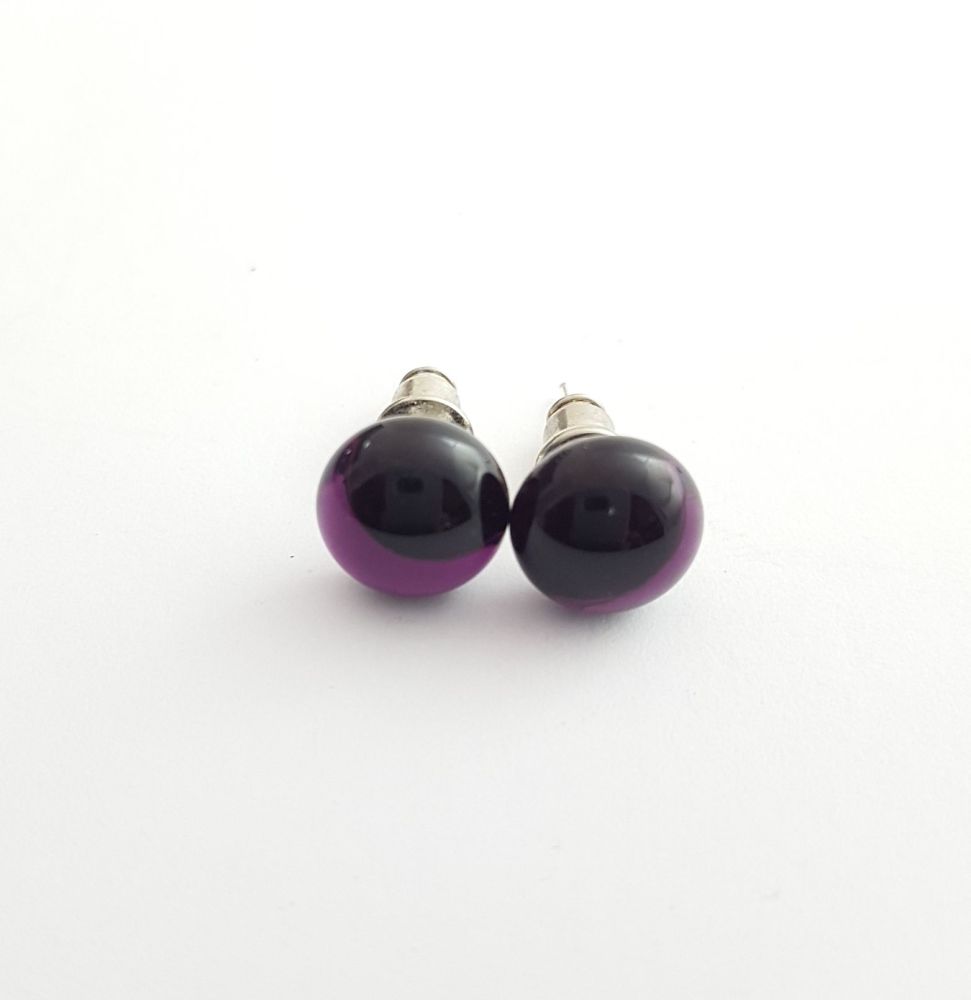 Dark purple transparent glass stud earrings