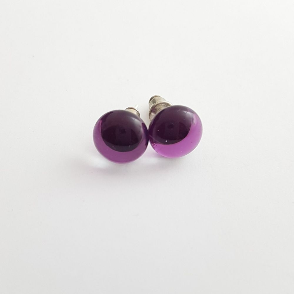 Deep purple transparent glass stud earrings