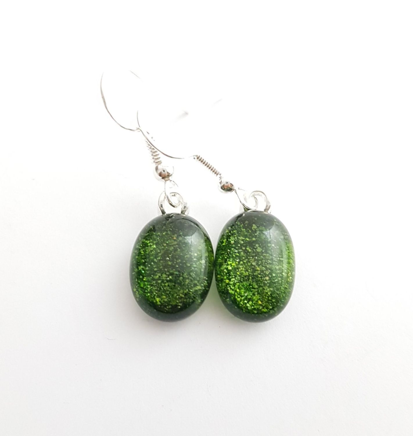 Green sparkly store earrings