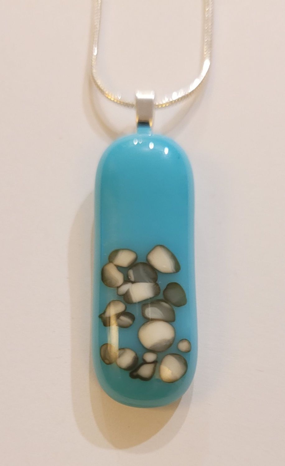 Turquoise and vanilla grains long pendant