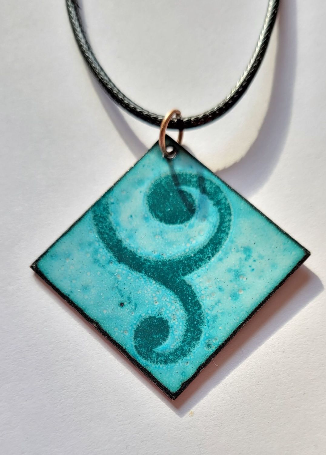 Pale teal with a jade green swirl necklace
