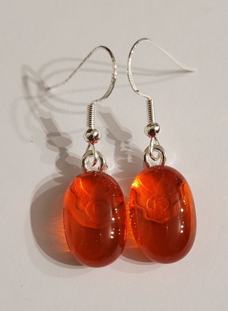 Bright orange transparent glass drop earrings