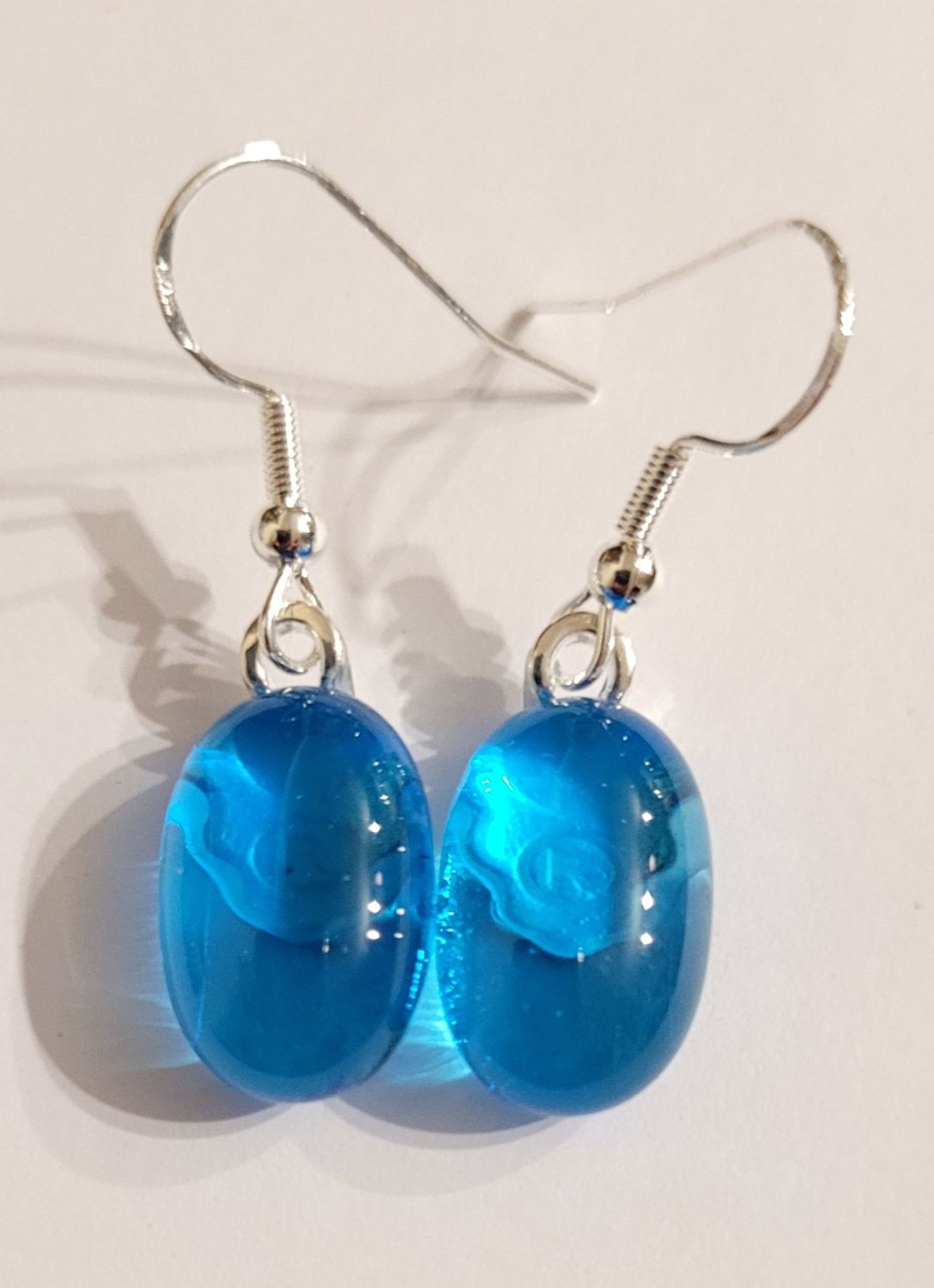 Turquoise blue transparent earrings