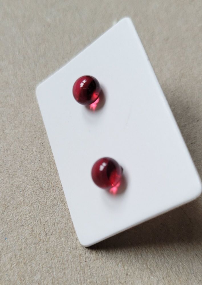 Dark cranberry pink transparent tiny glass stud earrings