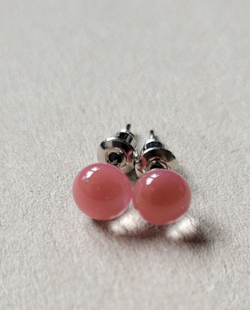 Salmon pink opaque tiny glass stud earrings