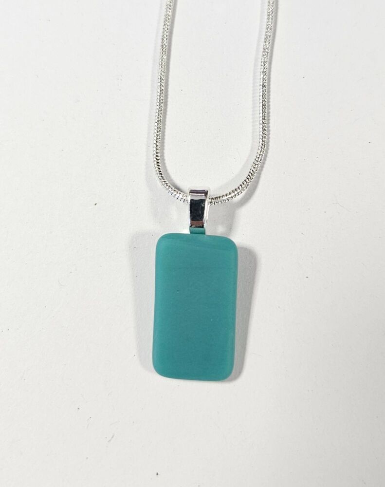 Frosted "sea glass" effect opaque teal flat pendant