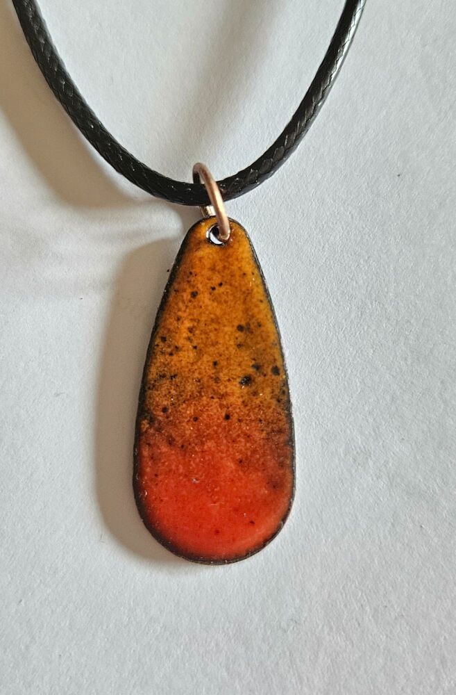 Orange red fading through to orange necklace.