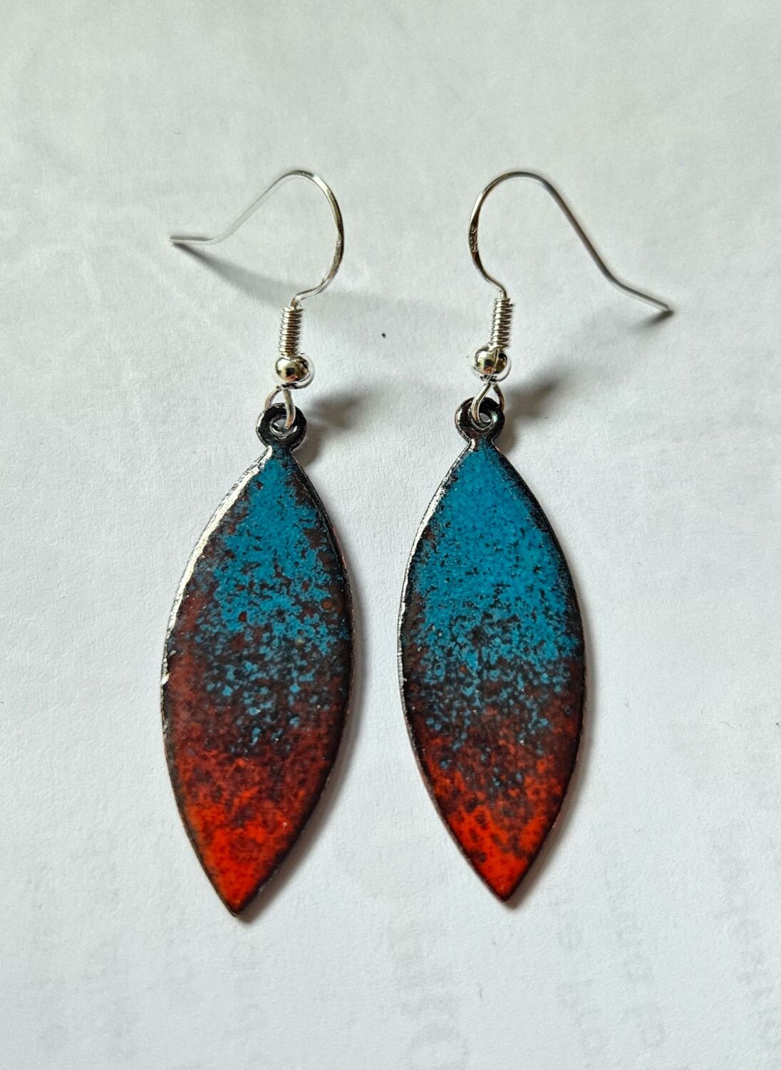 Teal blue fades into dark orange-red enamelled earrings