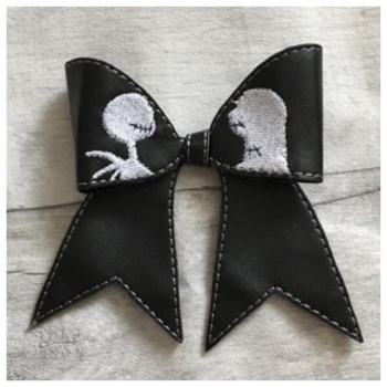 Skull silhouette bow parts 4”