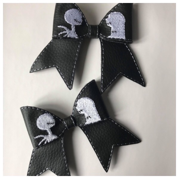 Skull silhouette bow parts 3”
